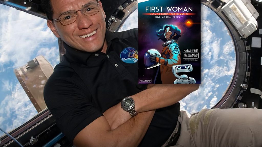 Image of Frank Rubio with graphic novel First Woman