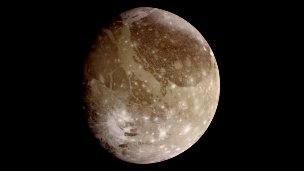 Image of The Juno probe over Ganymede