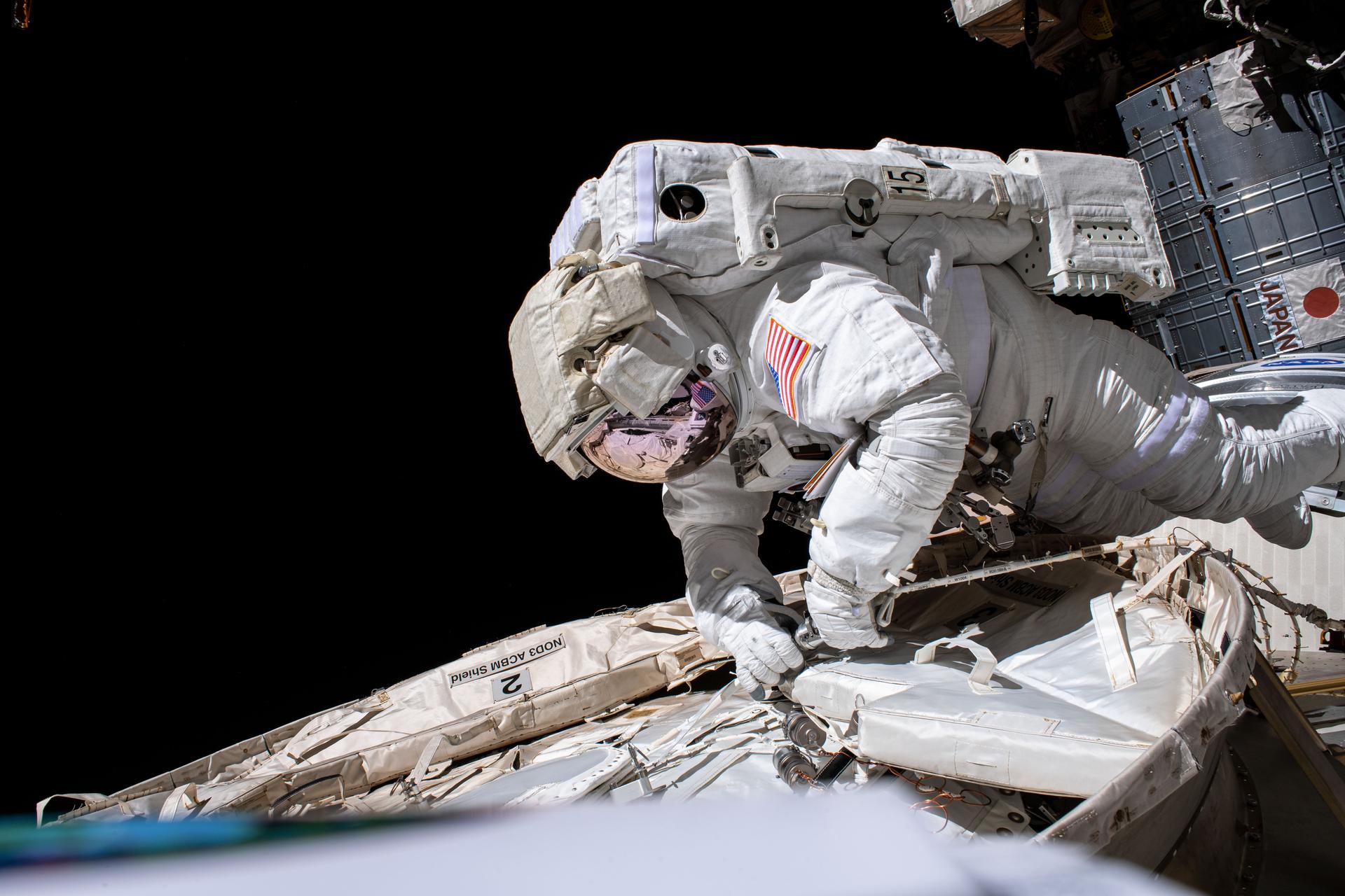 NASA Astronauts Conduct Spacewalks to Collect Microorganism Samples from ISS Exterior